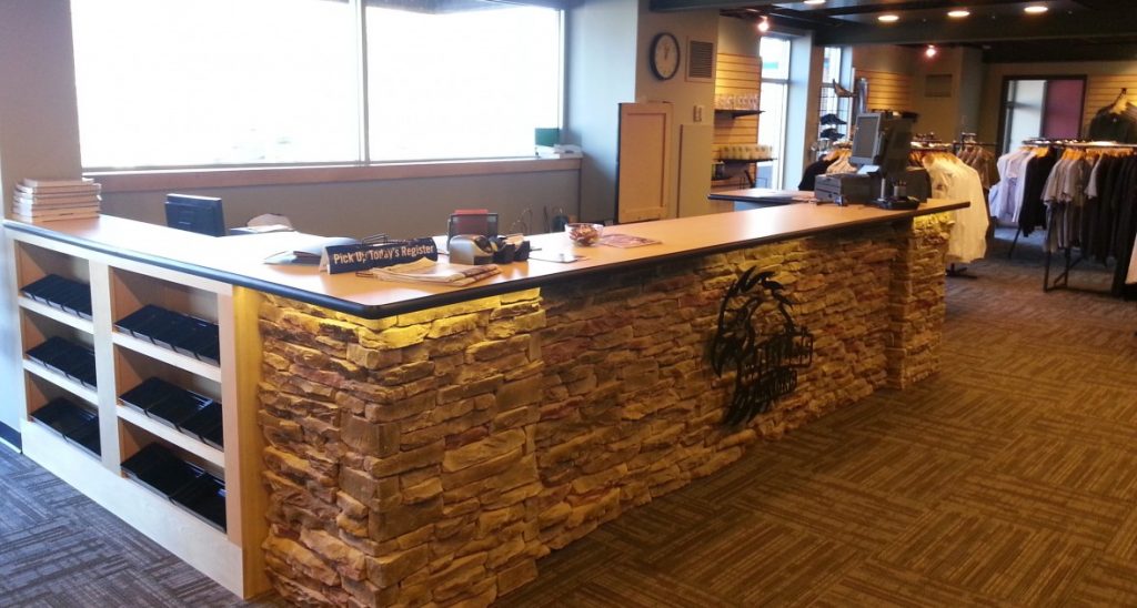 custom stone checkout counter in a college bookstore